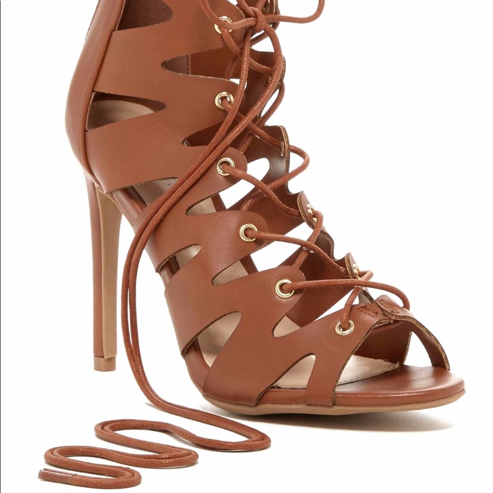 Brand Wild diva lounge, tan lace up heels.